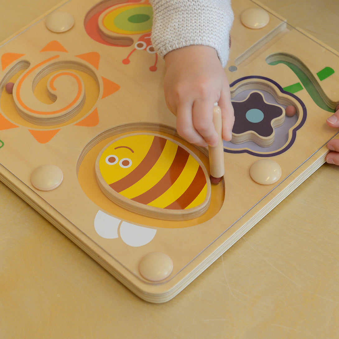 Insect illustrations attracting children’s attention and encouraging exploration.