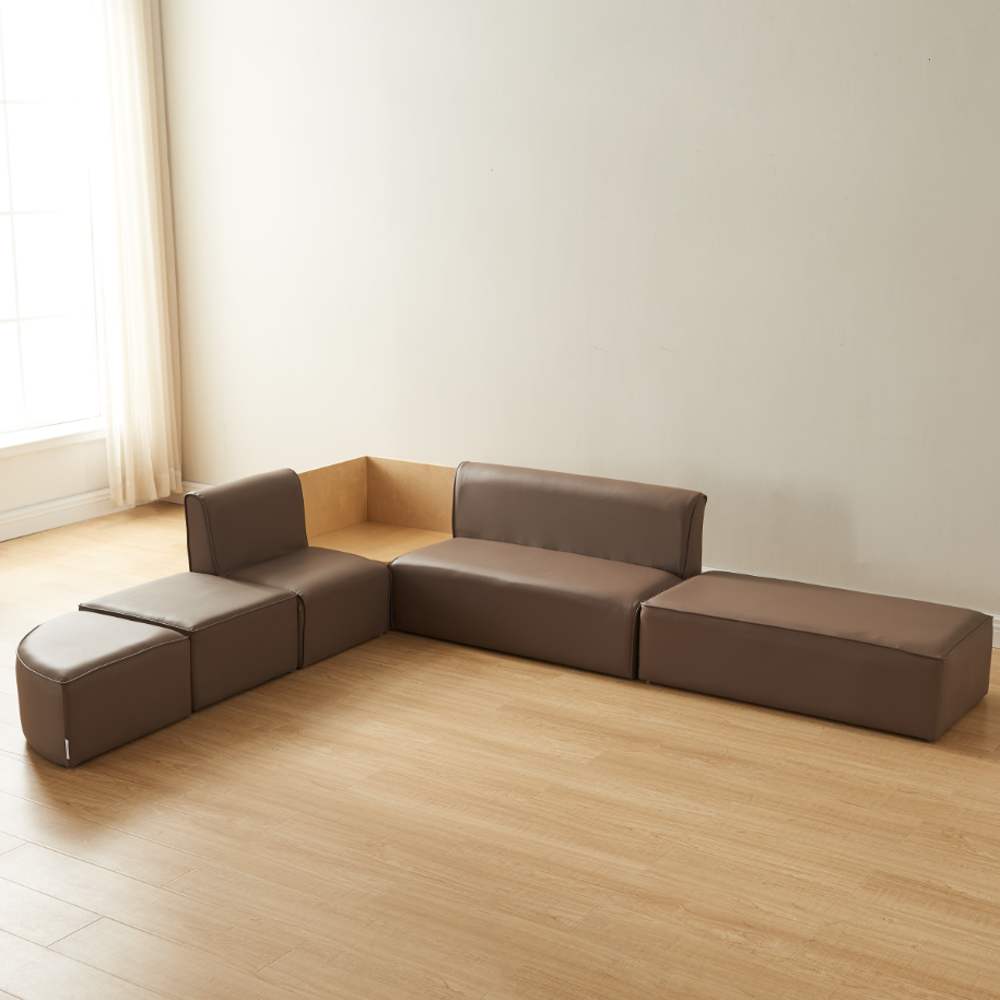 Children sitting on Masterkidz Neutral Modular Kids Sofa in playroom