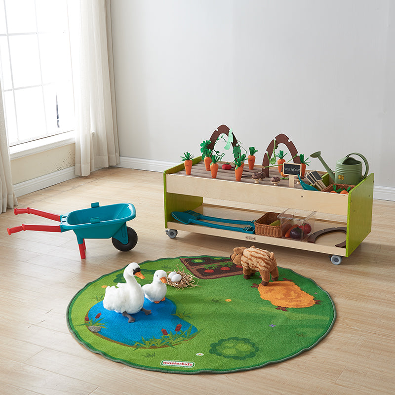 Close-up of soft fabric soil tubes creating a realistic farm experience.