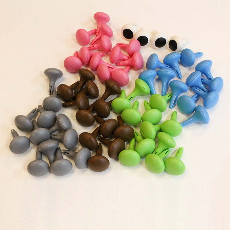 Children placing jumbo pegs into the Masterkidz STEM Wall grid.