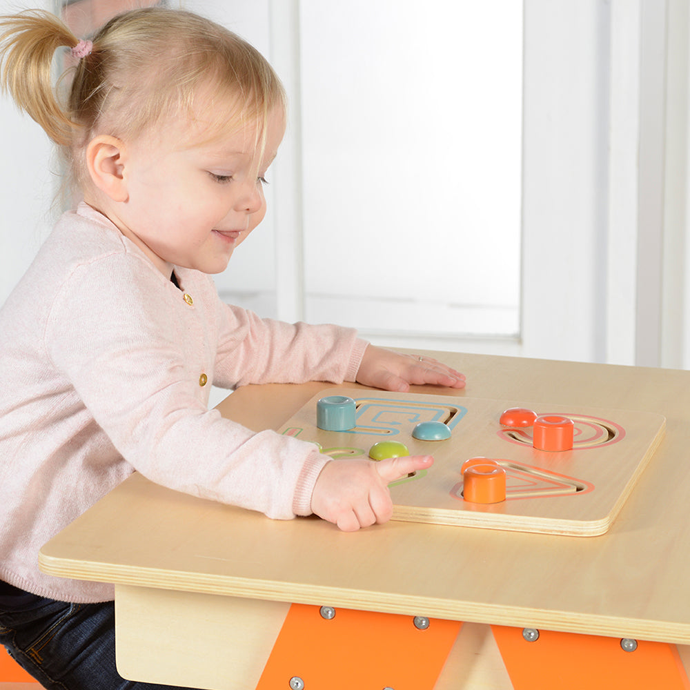 Montessori-style wooden toy promoting hand-eye coordination and focus.