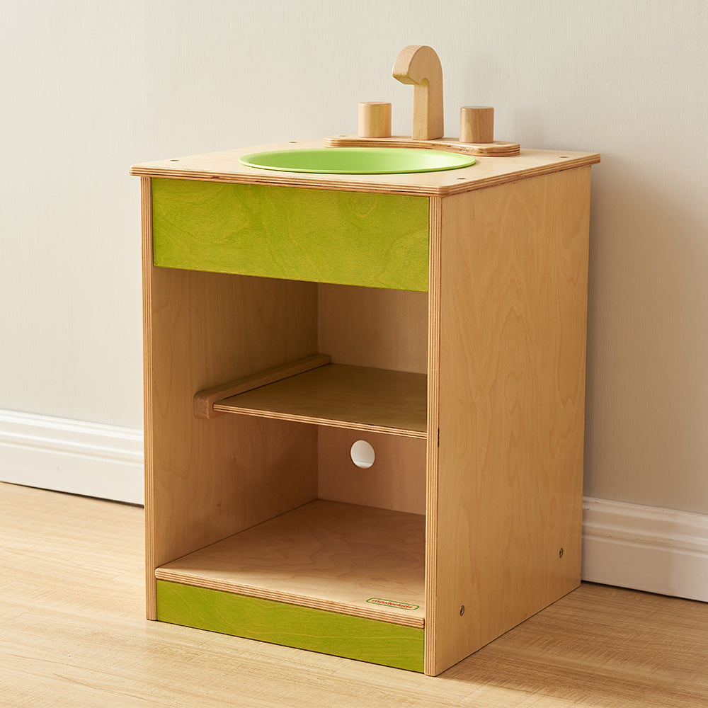 Masterkidz pastel wooden sink unit with mixer tap and green bowl.