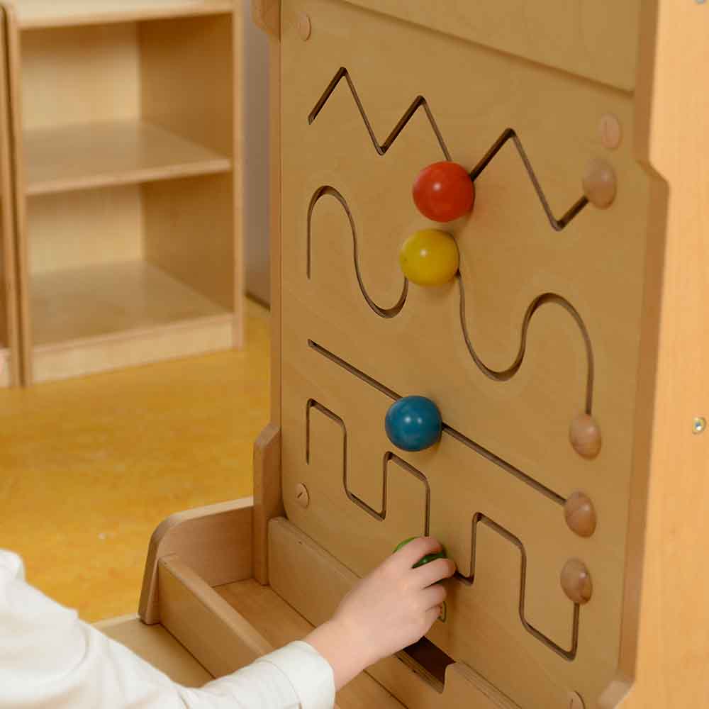Masterkidz wall element used in preschool fine motor skill activities.