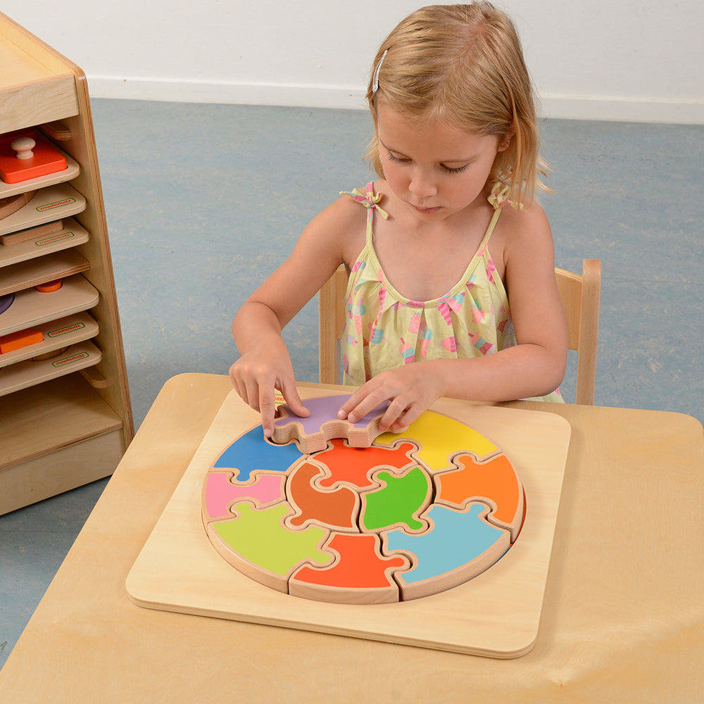 Large geometric puzzle pieces made from FSC Beech wood.