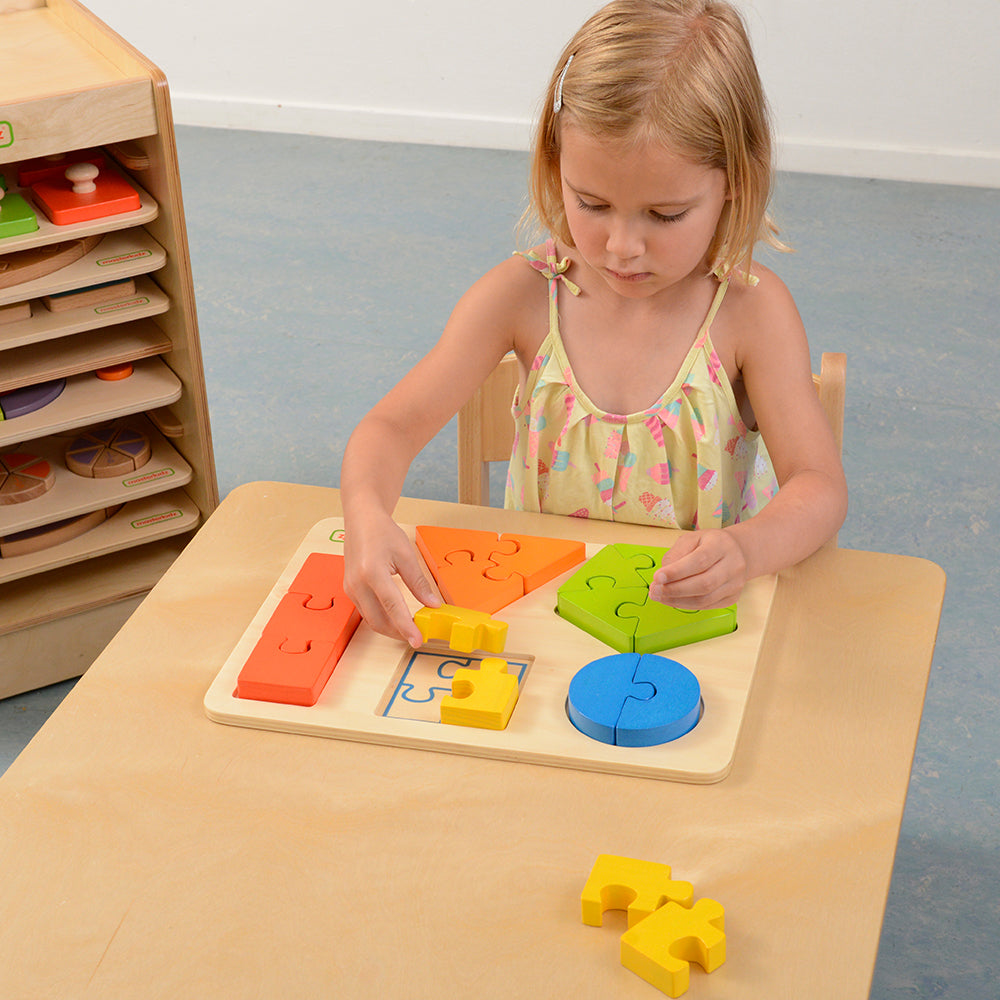 Five-piece geometric jigsaw set for classroom education.