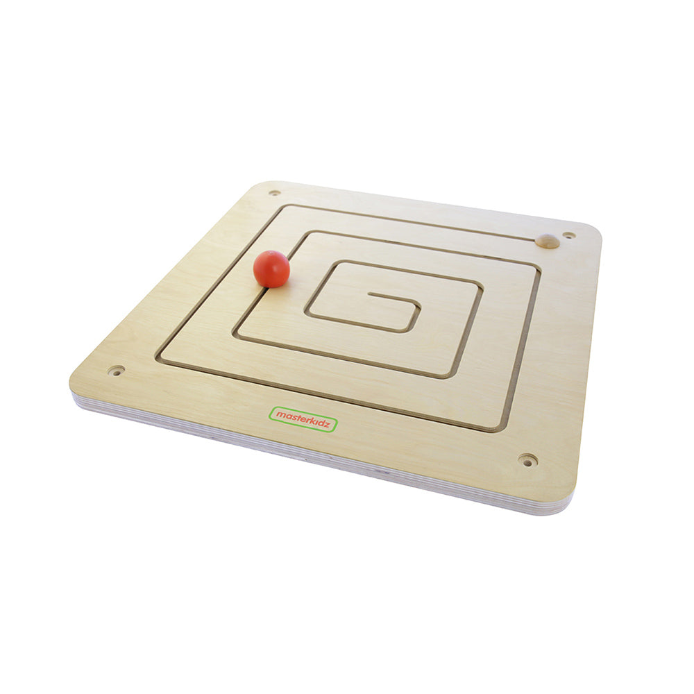 Square sliding maze educational toy mounted on classroom wall.