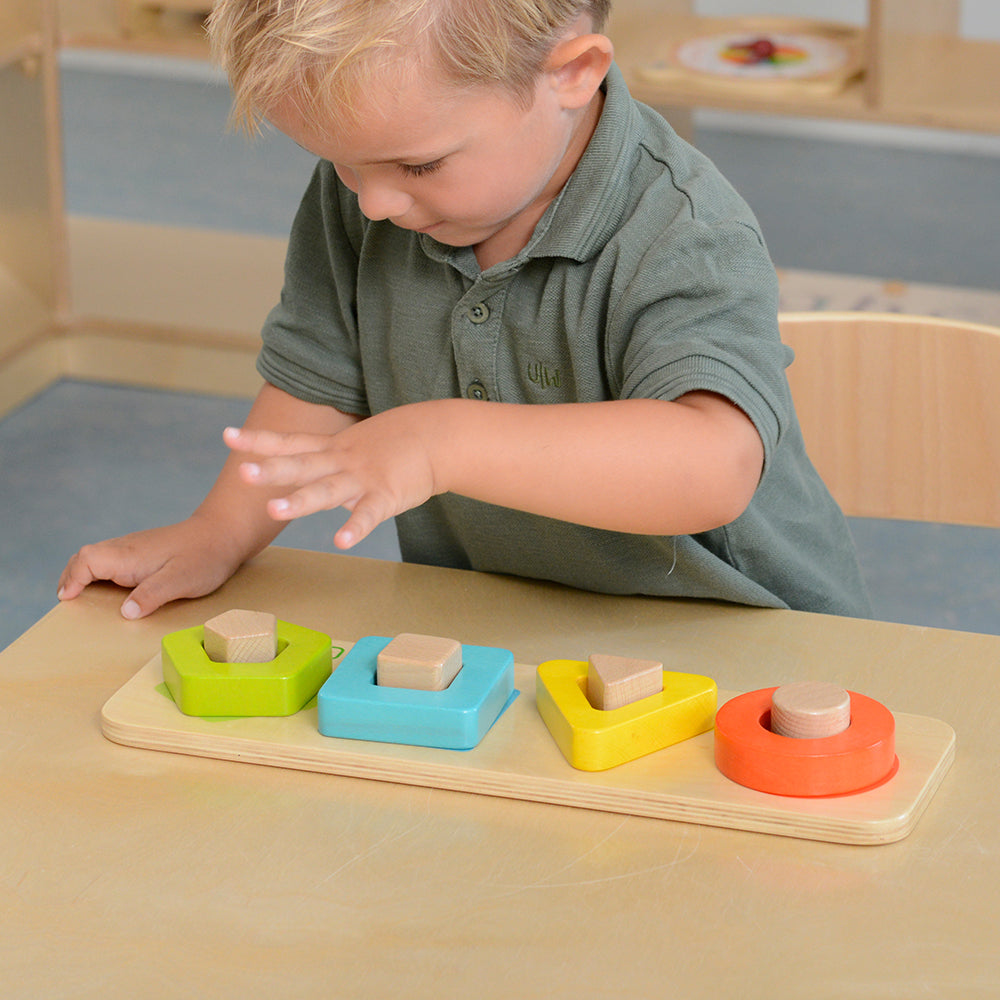 Fine motor skills learning activity with peg puzzle