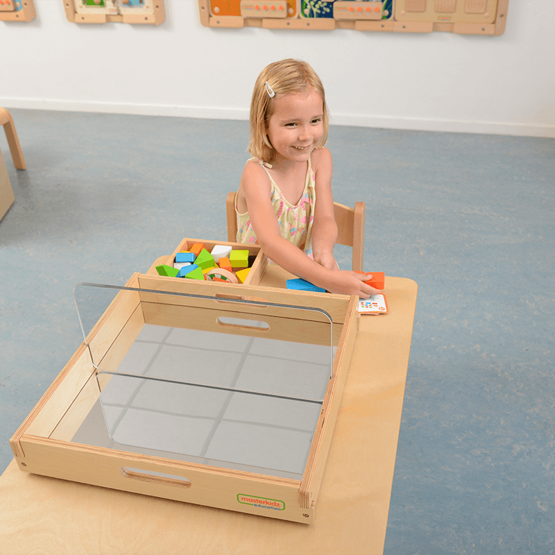 Montessori sensory exploration with mirror tray