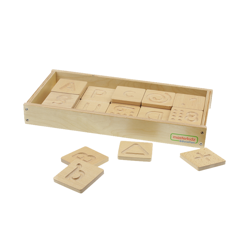 Preschool children practicing fine motor skills with tactile panels