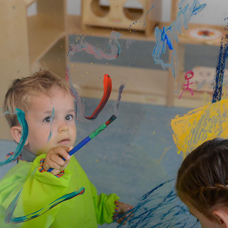 Paper roll mounted giant painting wall for continuous drawing