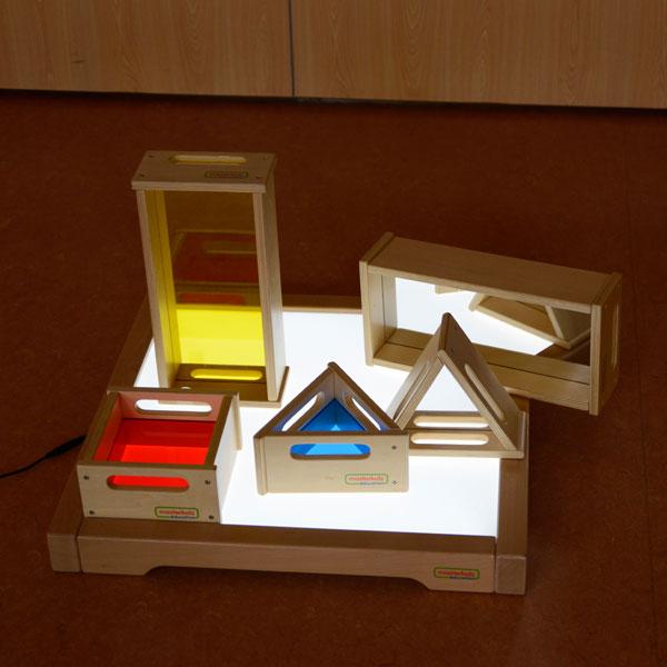 Giant wooden blocks with coloured acrylic inserts for classroom play