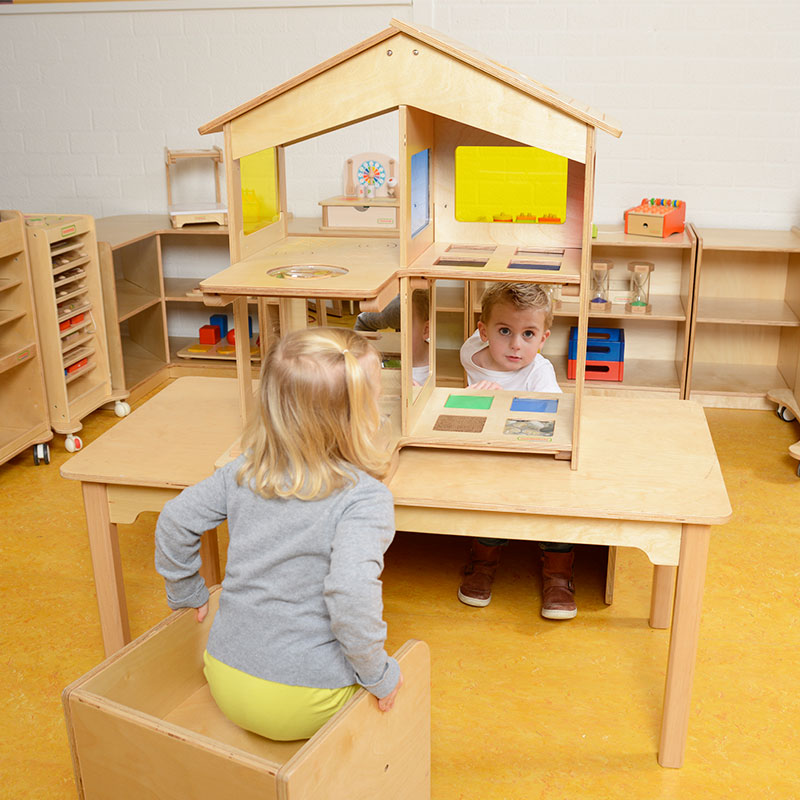 Wooden sensory house with color windows, mirror room, and tactile play features for early learning.