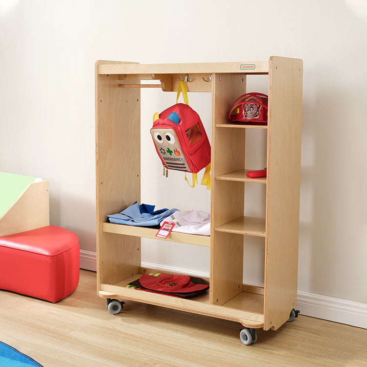 Children selecting costumes from Masterkidz dress up trolley