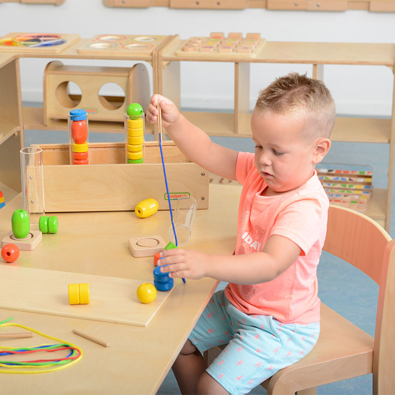 Kids stacking and sorting beads with height-marked clear tubes