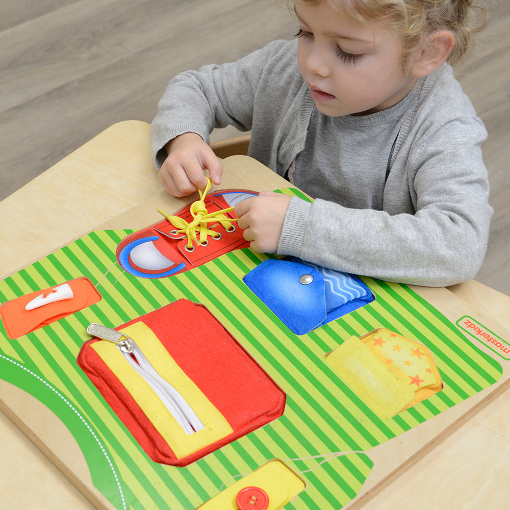 Montessori inspired dressing skills activity board
