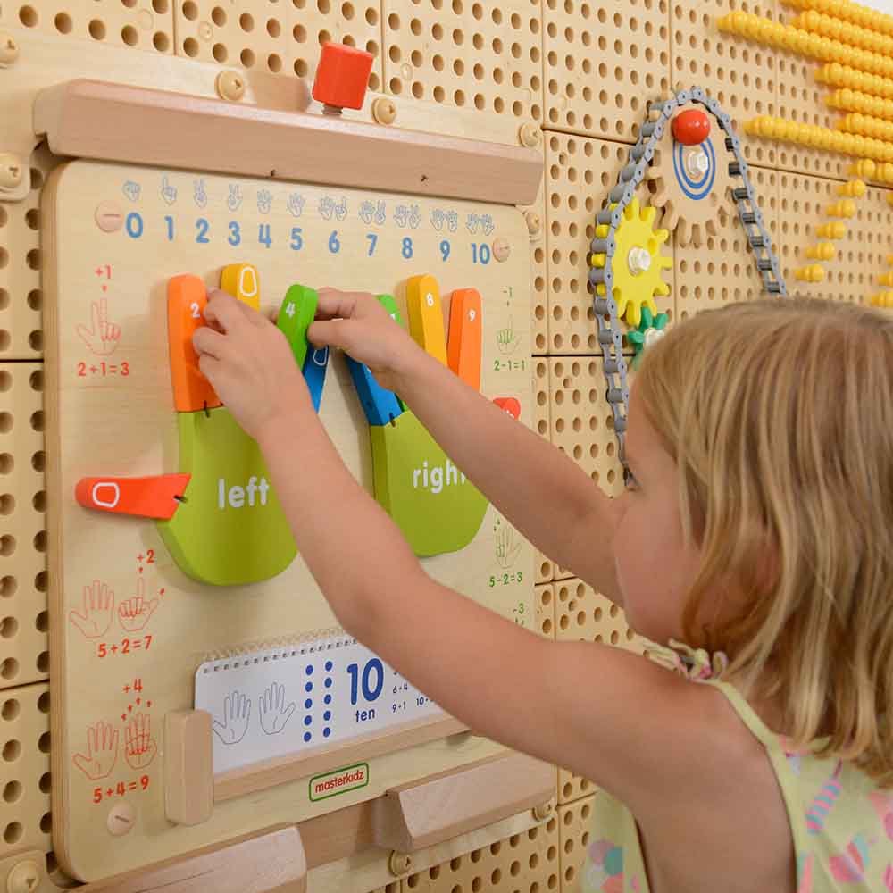 Kids practising addition and subtraction with finger counting board