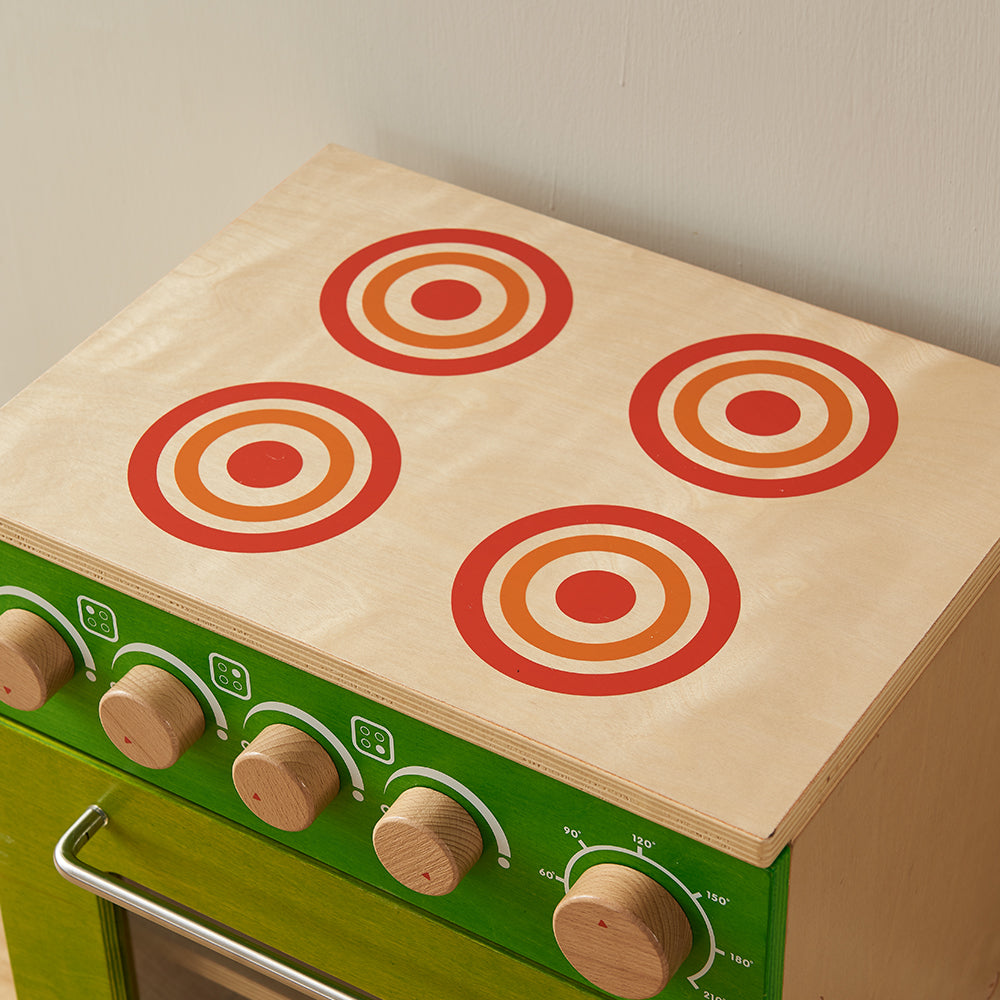 Preschool kids using Masterkidz cooking unit during role-play activities.