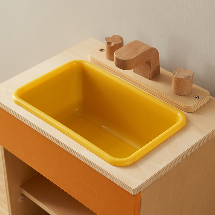 Children’s role-play sink with hot and cold mixer taps.