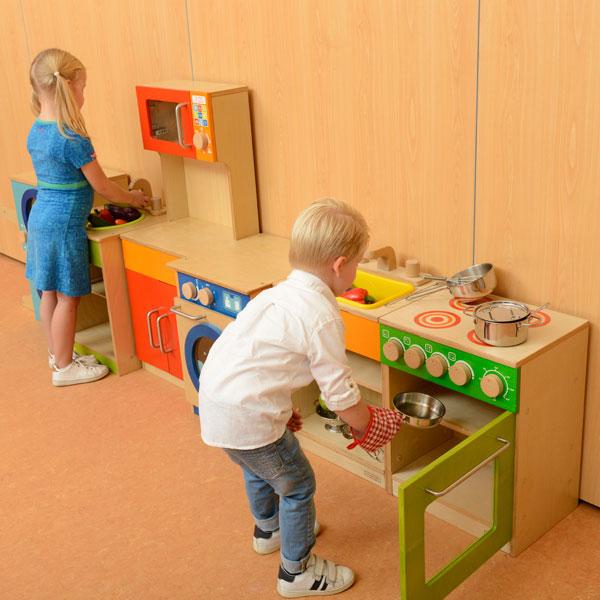 Tall play kitchen cabinet with red and orange double doors.
