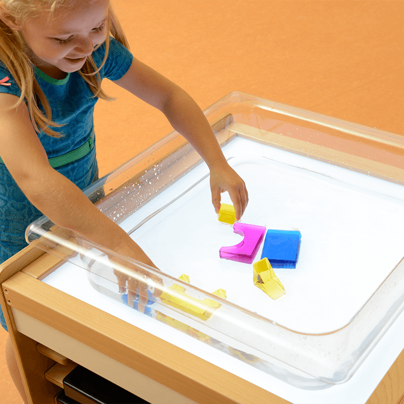 Water-based sensory play and exploration tray