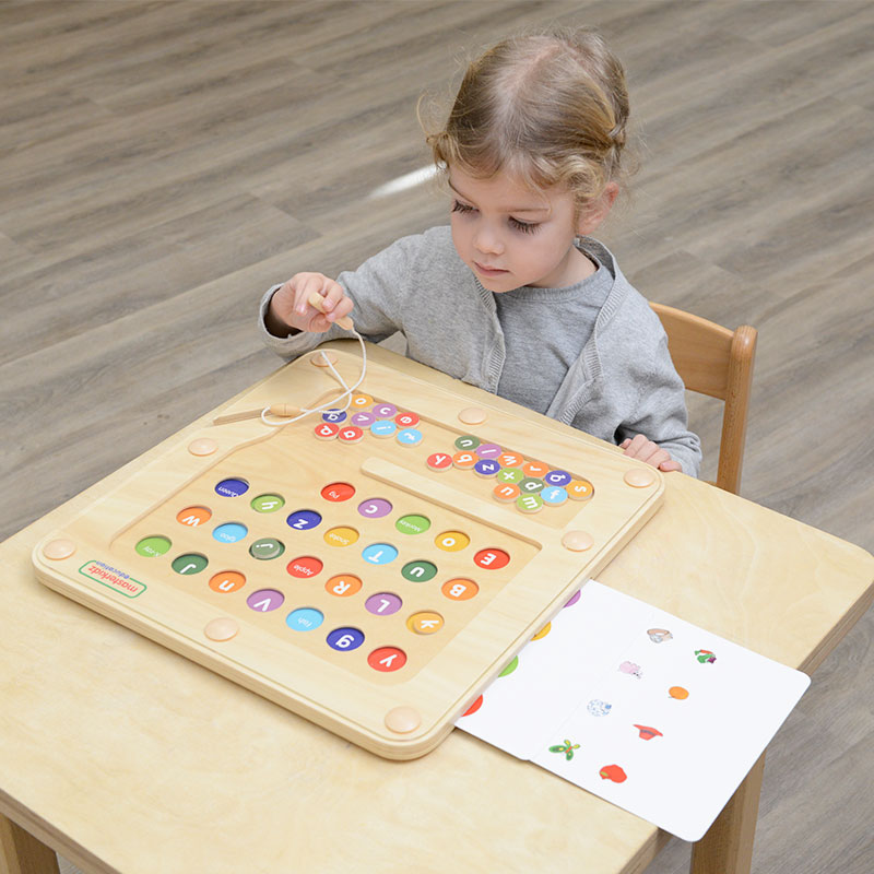 Masterkidz；Children matching letters on magnetic alphabet board