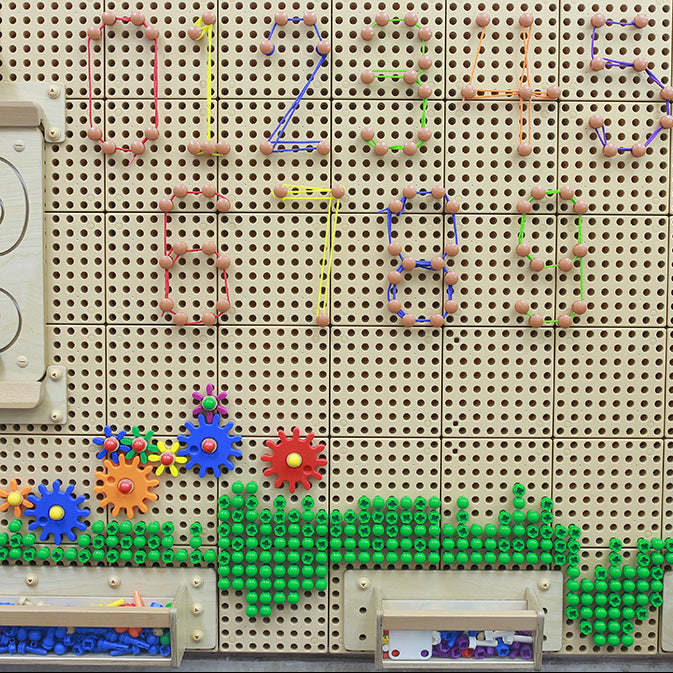 Children enhancing hand-eye coordination with Masterkidz STEM Wall Accessories Lacing Pegs 200Pcs.