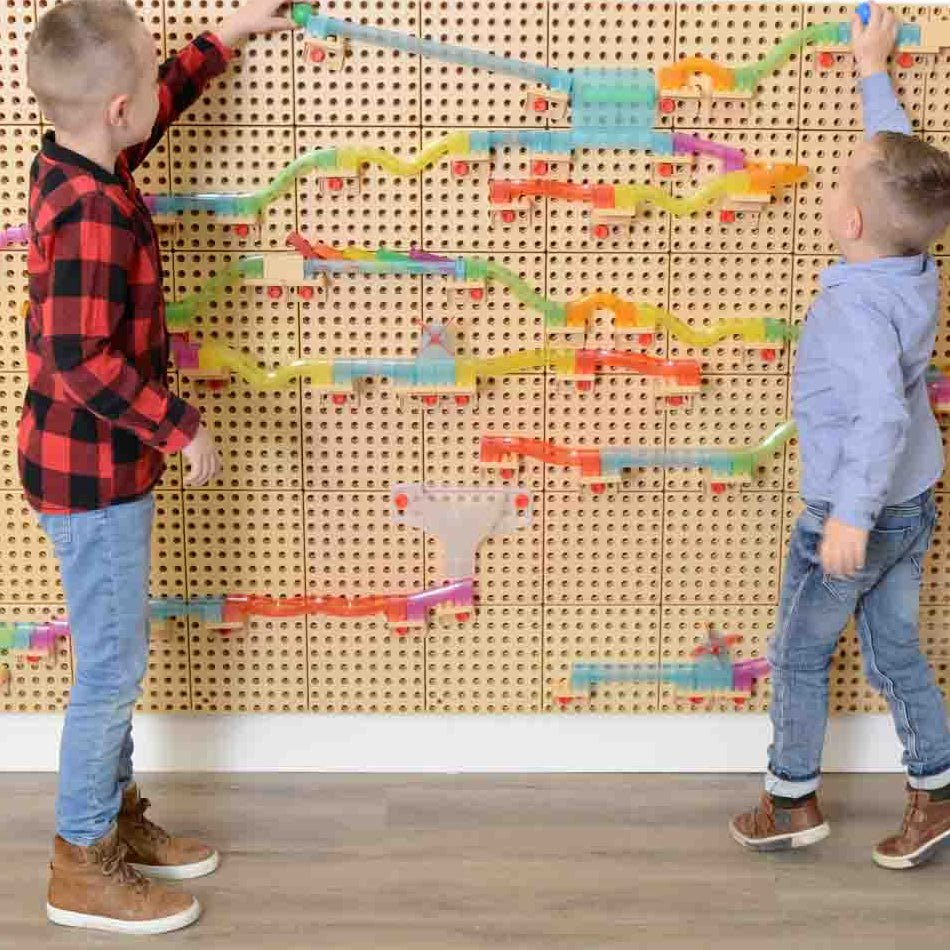 Children building their own ball tracks with Masterkidz Kinetic Ball TraX 120Pc – STEM learning in action.