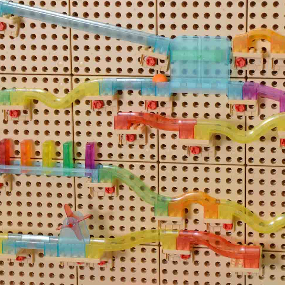 Building vertical and horizontal ball tracks on Masterkidz STEM Walls with the Kinetic Ball TraX system.