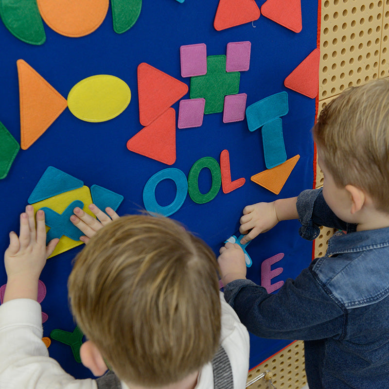 Close-up of Masterkidz felt alphabet letters with clear, bold fonts and Velcro backing for easy play