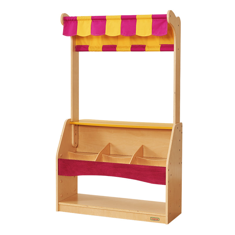 Wooden grocery stand toy with canopy for classroom role-play.