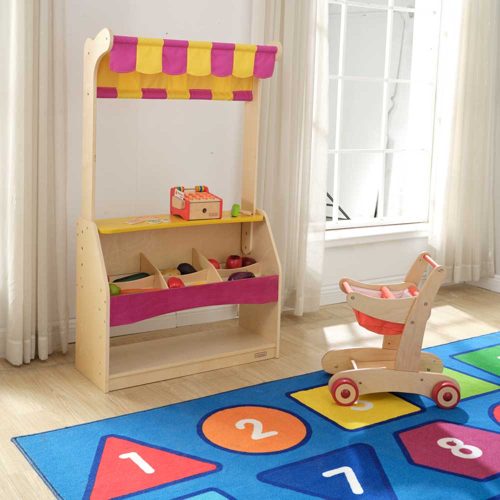 Large front display area ideal for pretend shopping activities.