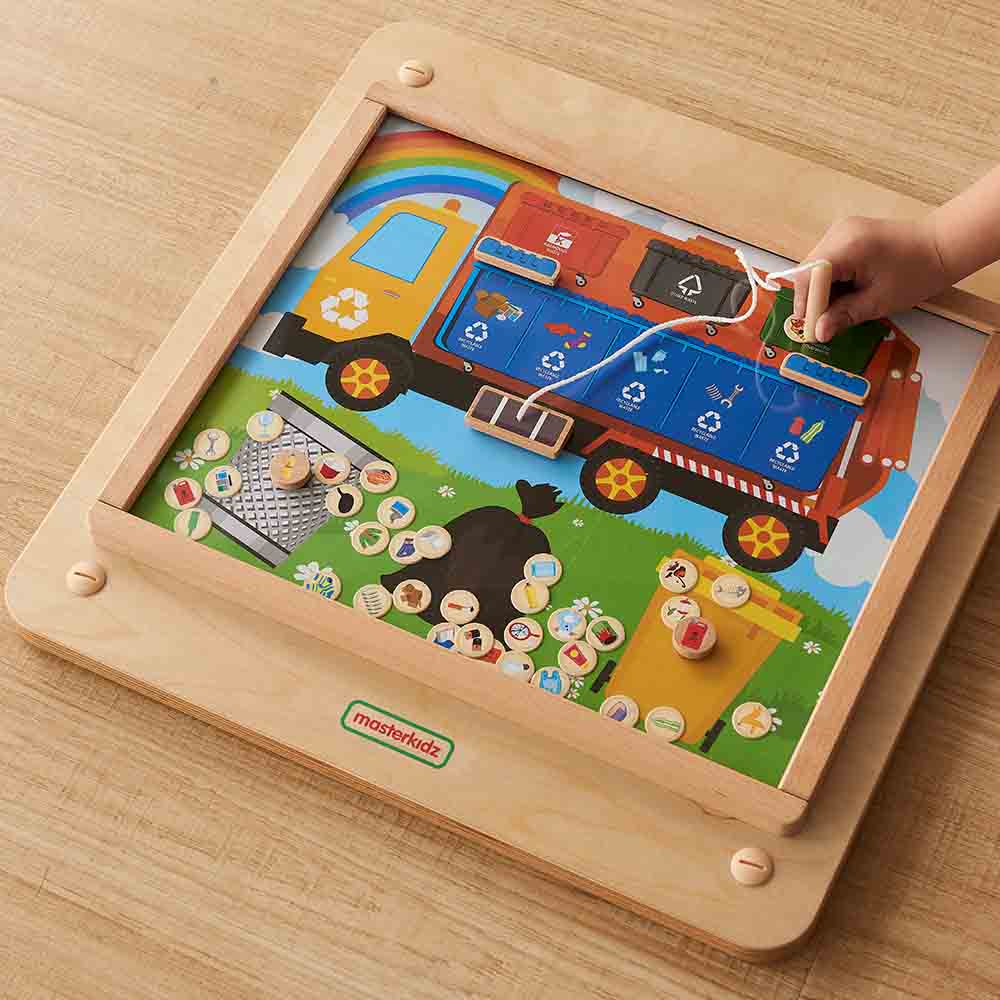 Kids learning recycling with wooden waste classification board