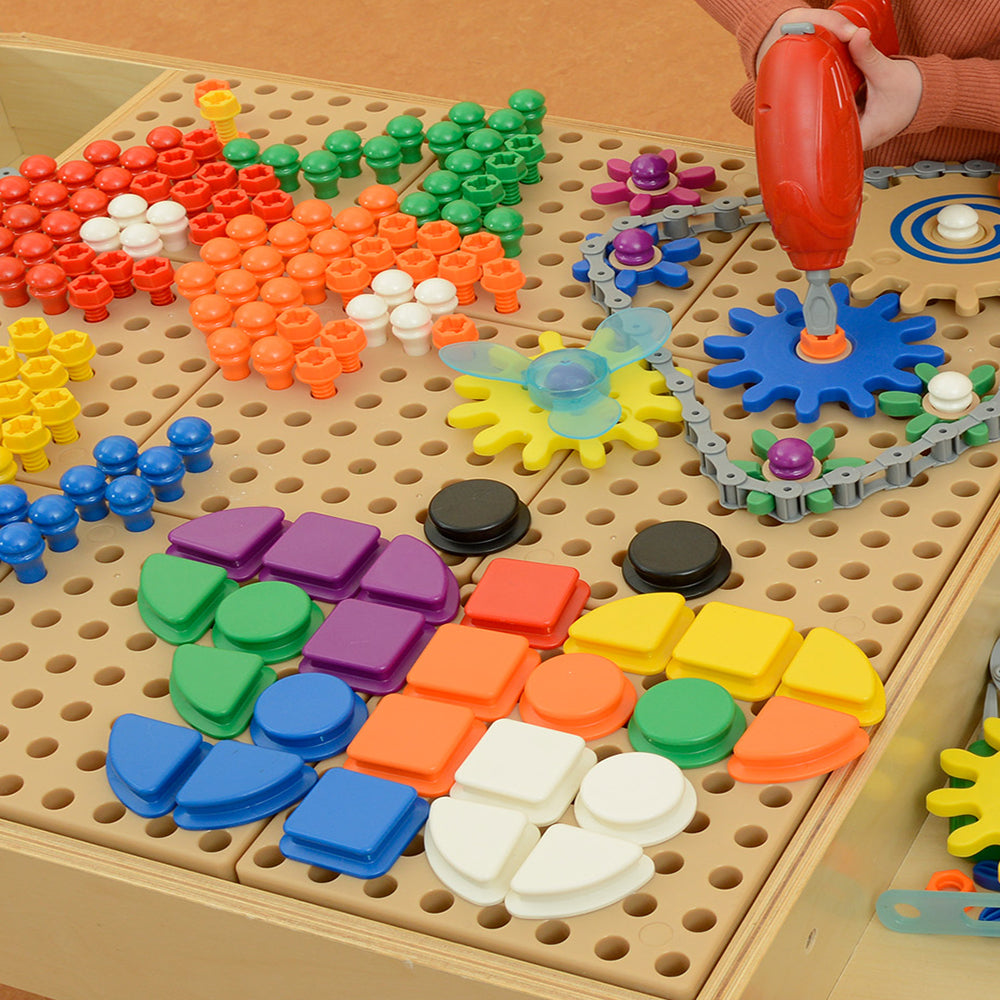 Children developing fine motor skills and STEM knowledge at STEM Table Starter Set