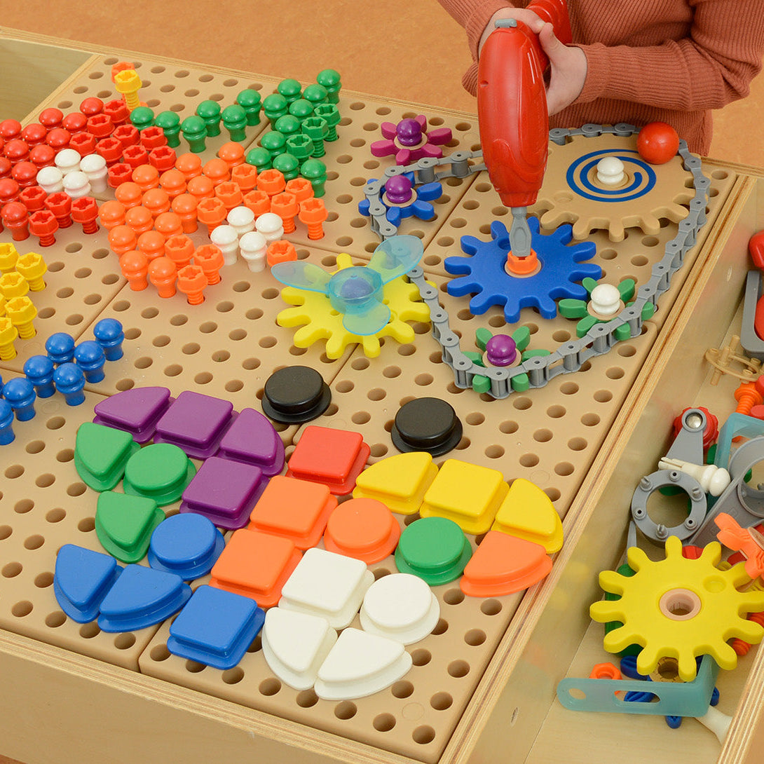 Close-up view of large push-in STEM tiles designed for toddlers and early learners.