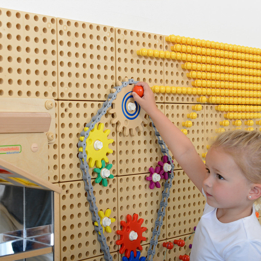 Masterkidz STEM Wall gears meshed together to create functional gear trains