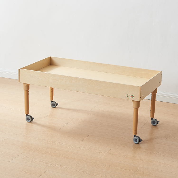 Close-up of the removable PE trays filled with sand and water, highlighting easy cleaning and tray depth.