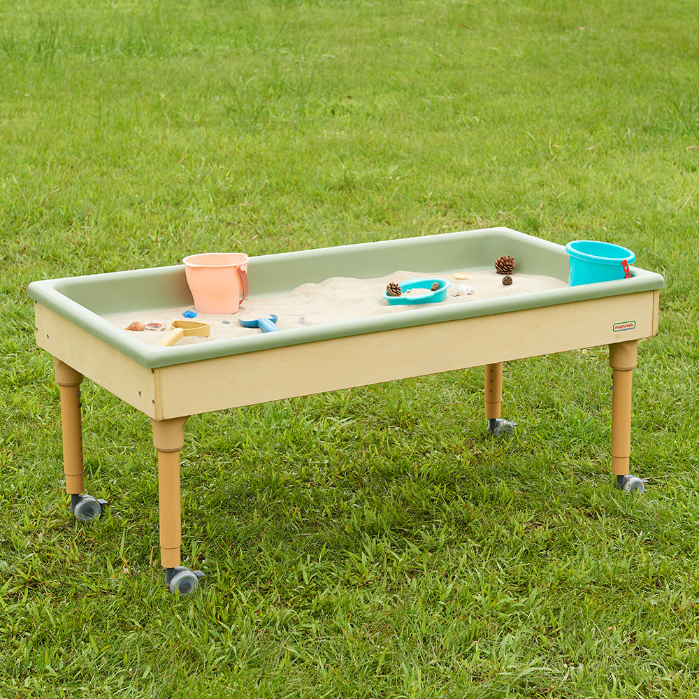Masterkidz height-adjustable mobile sensory table with natural wood finish and blue PE trays.