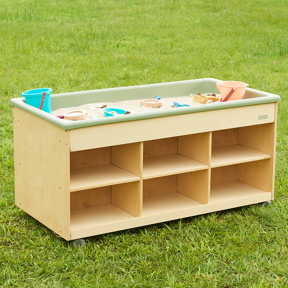 Detail shot of the heavy-duty lockable caster wheels on the Masterkidz birch plywood base.