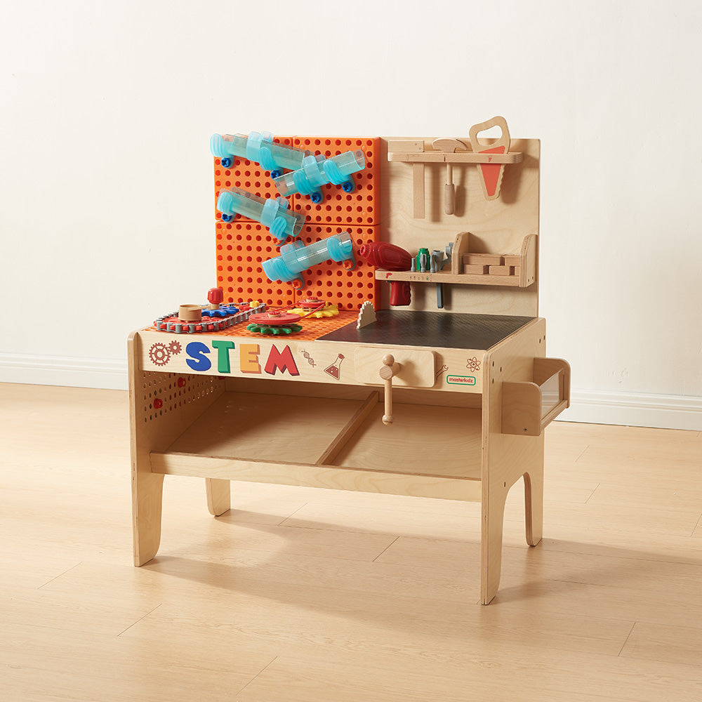 Accessories and mechanical components arranged neatly on the workbench.