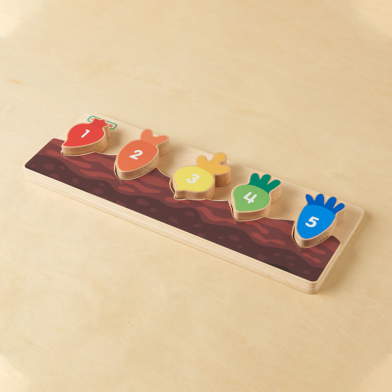 Interactive early learning toy for developing colour and number recognition.