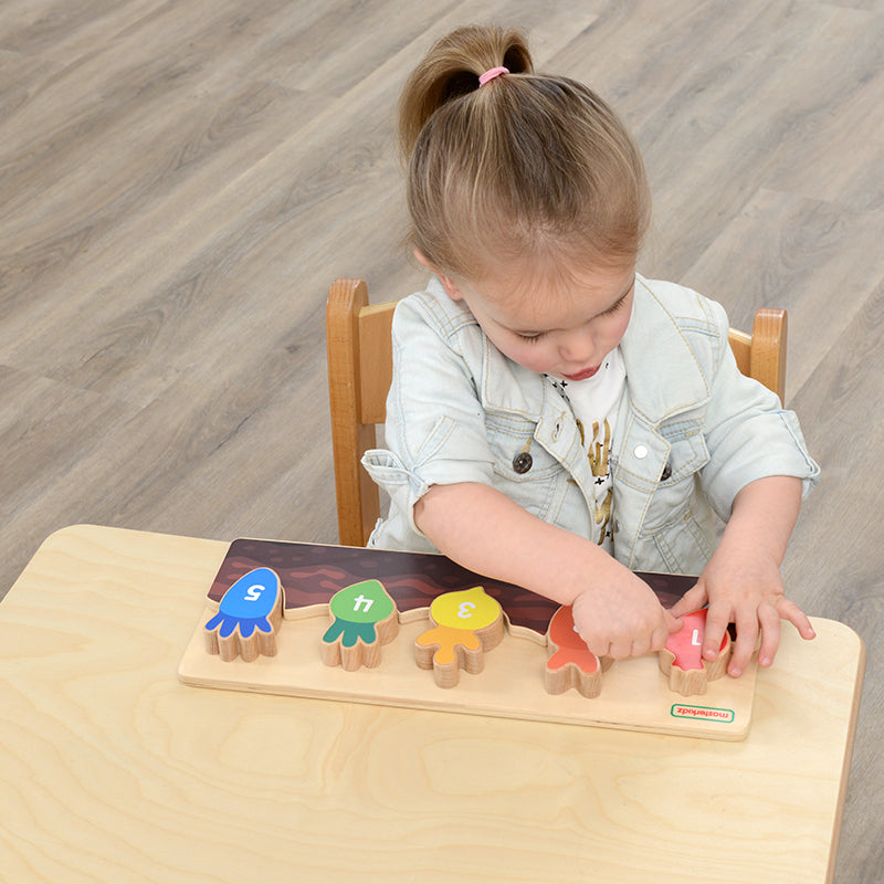 Colourful carrots with numbers 1-5 for early learning activities.
