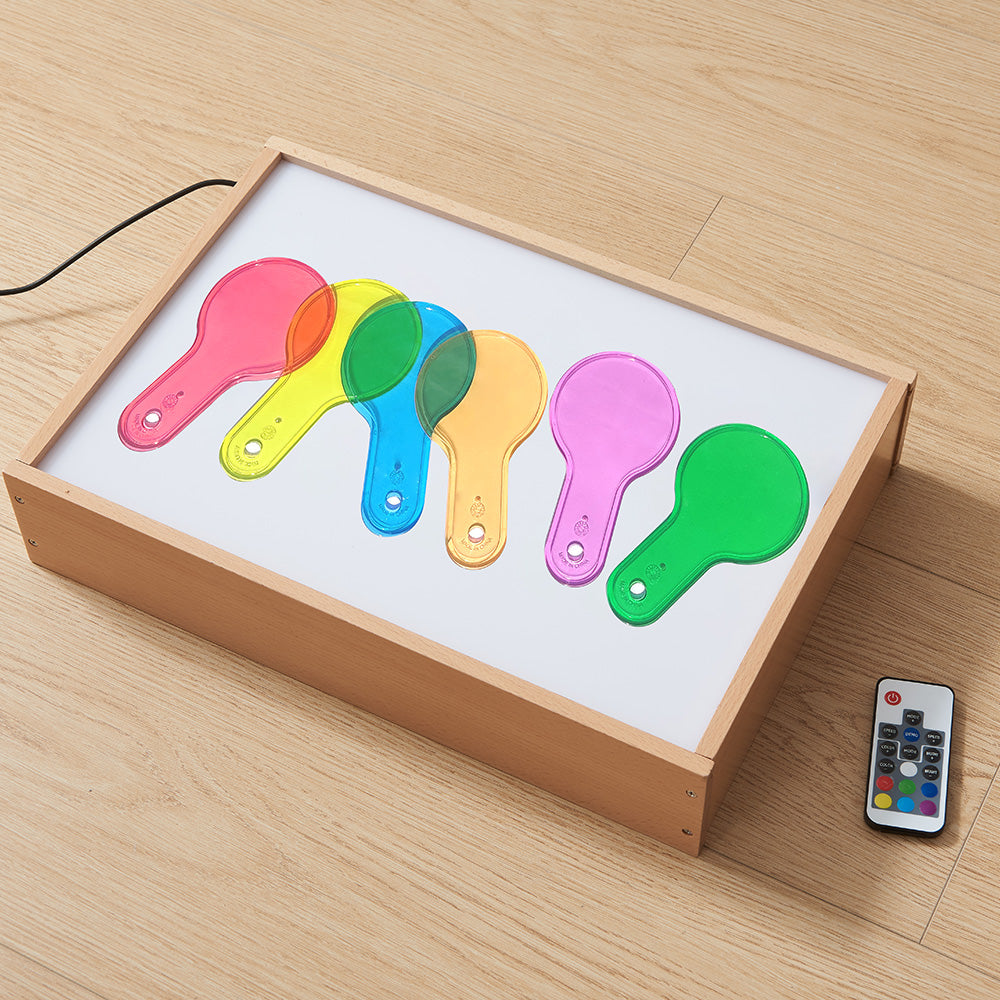 Six translucent colour paddles for colour mixing and light exploration.