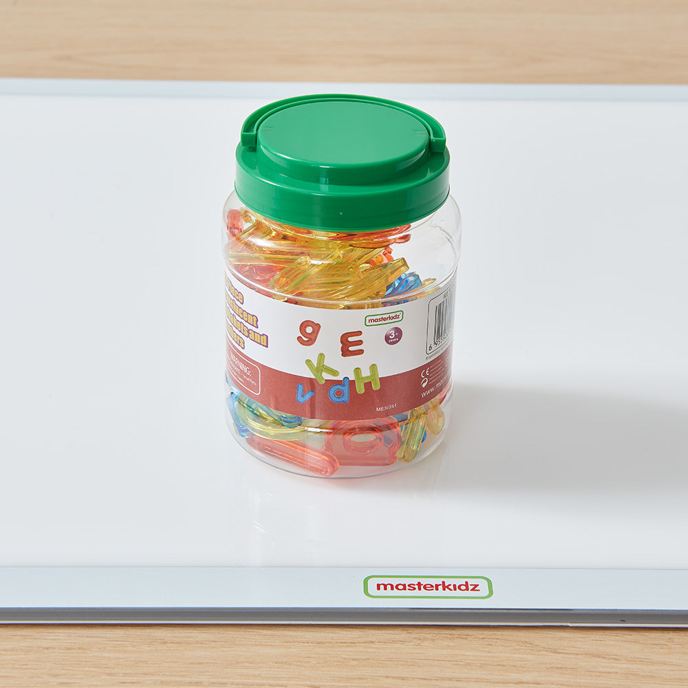 Letter tracing activity using translucent plastic letters
