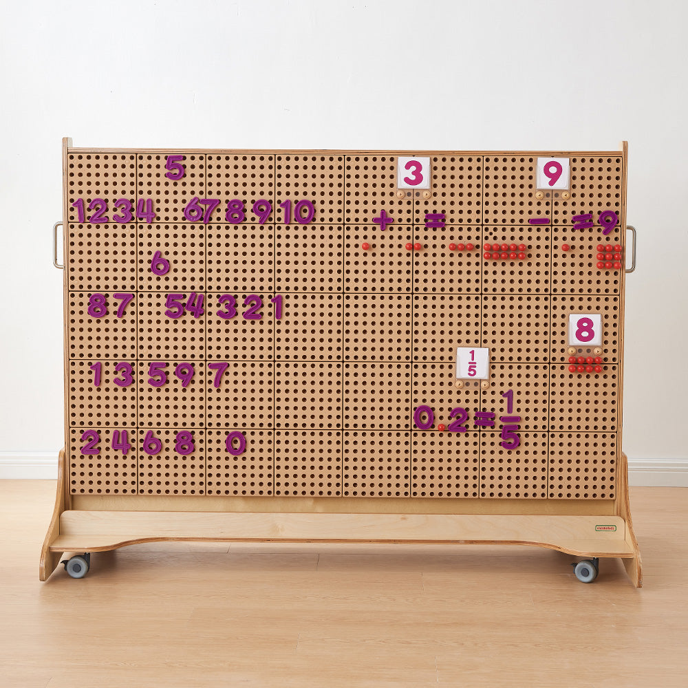 Classroom group activity with students collaborating on creative STEM challenges.