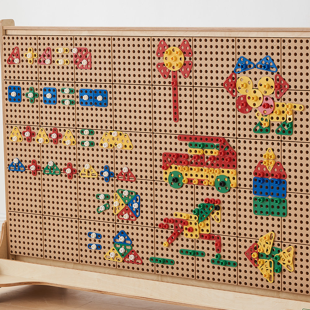 Students learning symmetry and geometry through hands-on building activities.