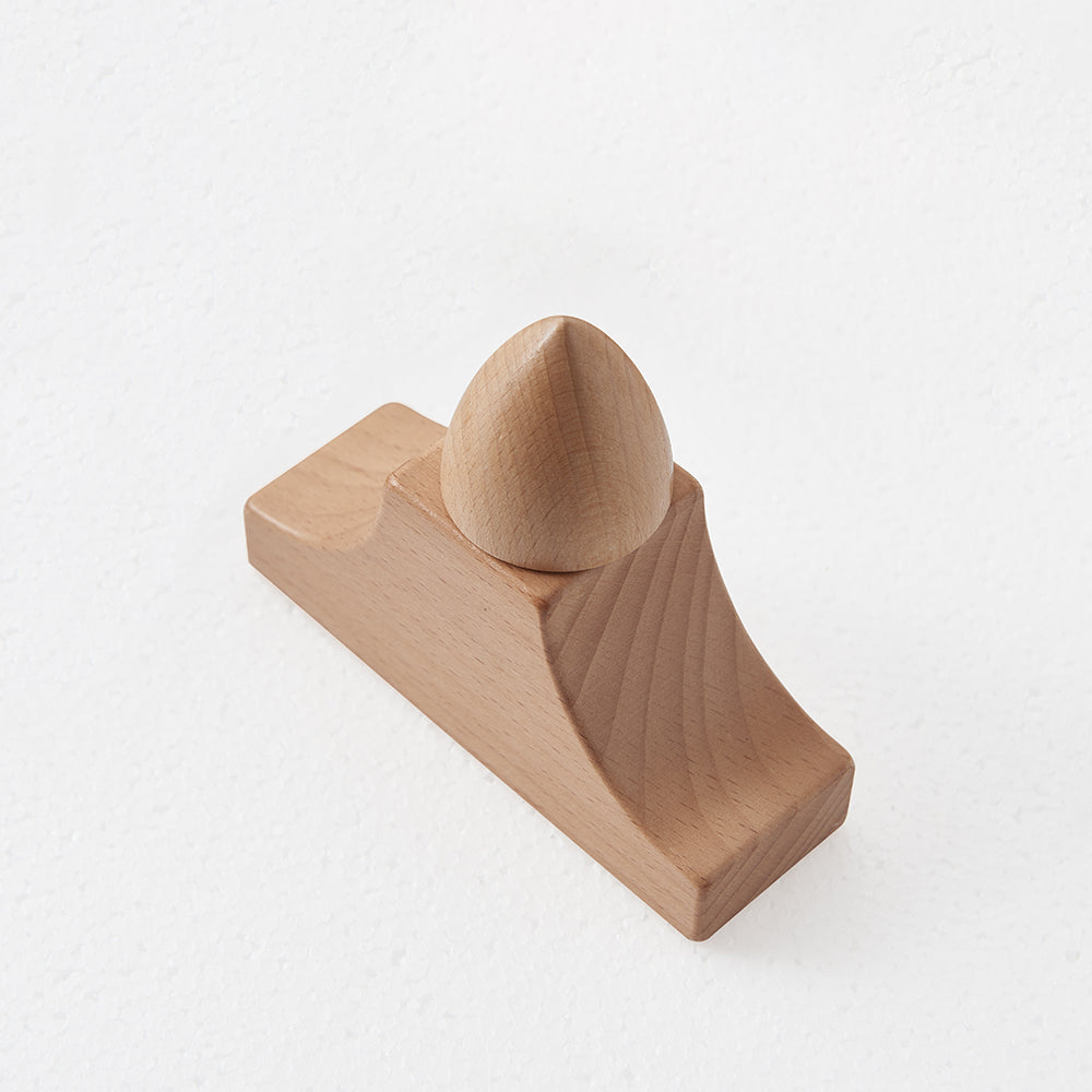 Masterkidz castle building blocks arranged on a carpeted play area in a school setting.