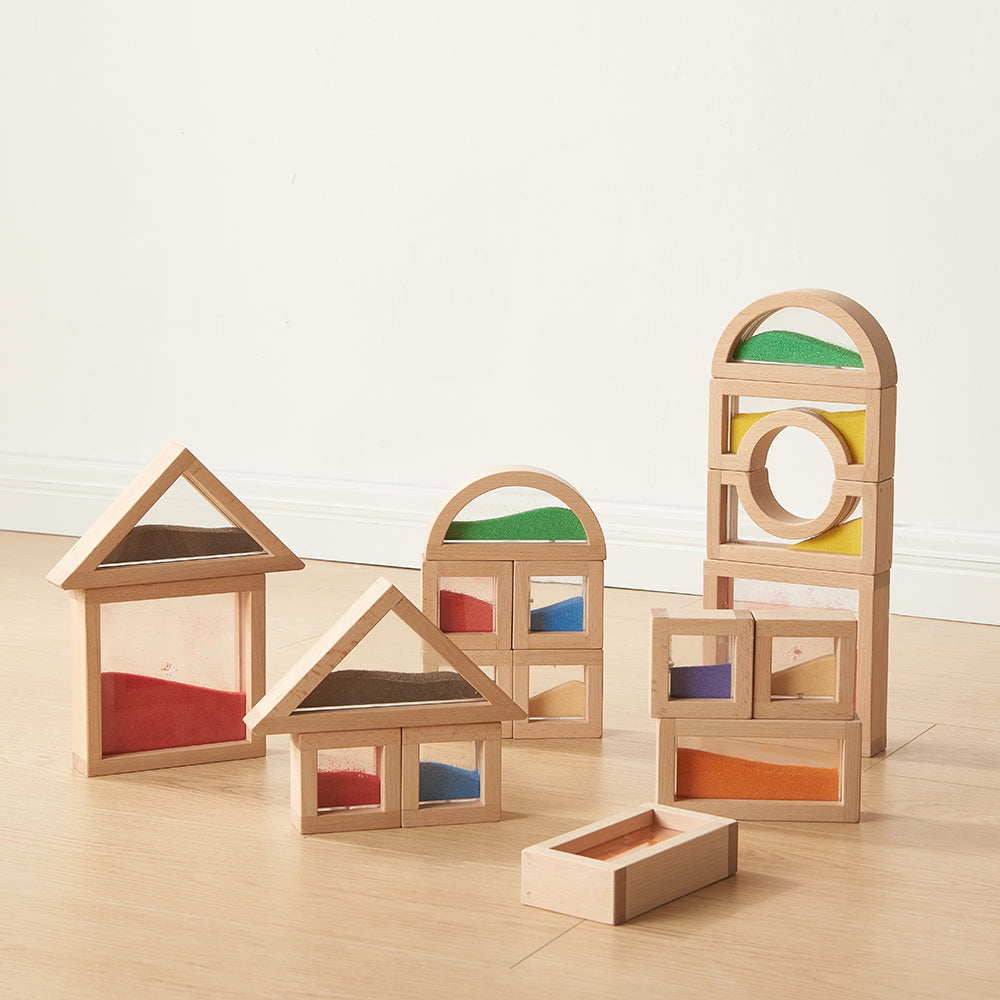 Close-up of sand flowing inside a clear acrylic block when shaken.