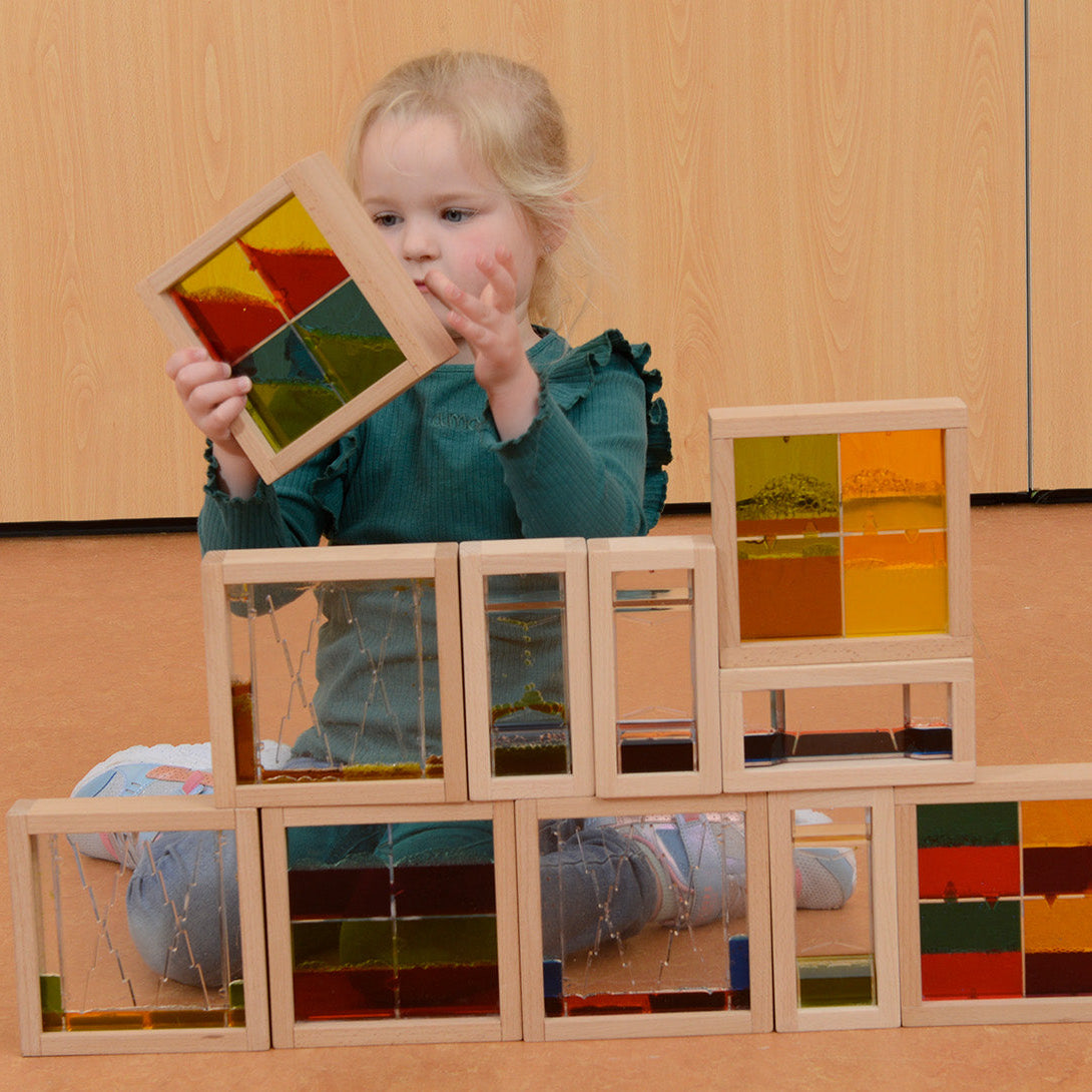 Liquid globules cascading like steps to form pools at the bottom of the block.