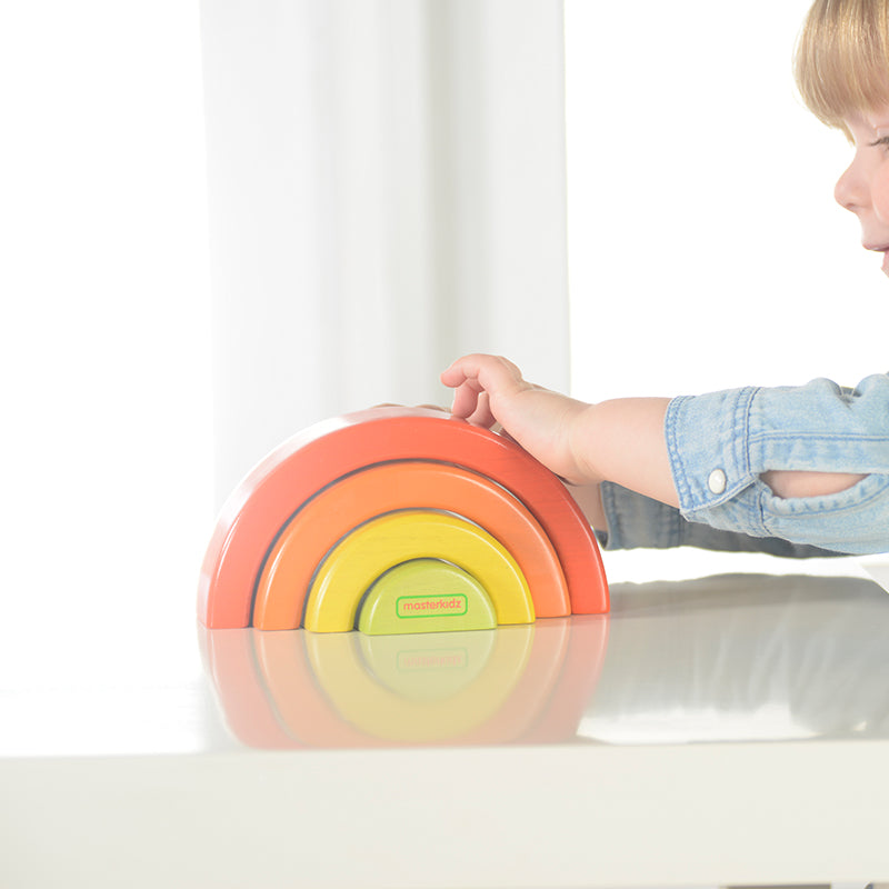 Fine motor skill development toy with rainbow pieces