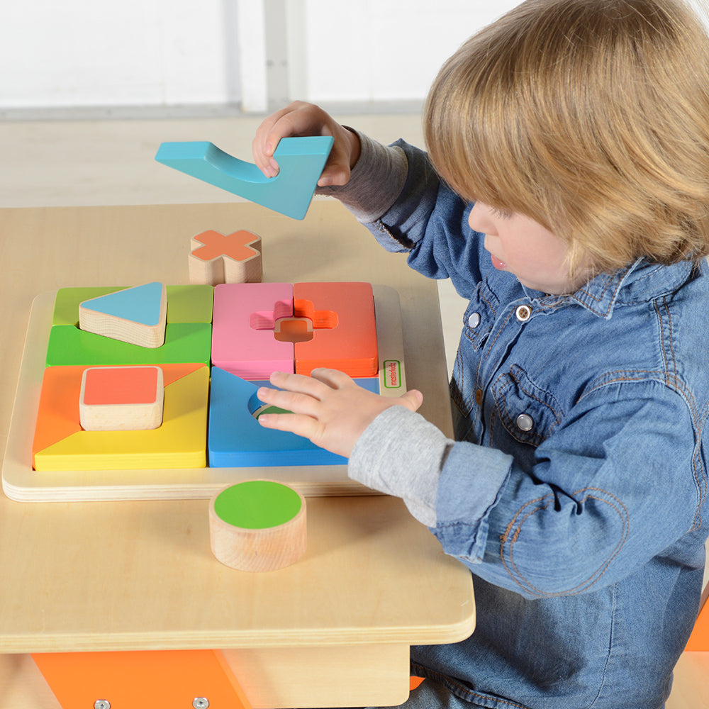 Fine motor skill development toy with geometric blocks